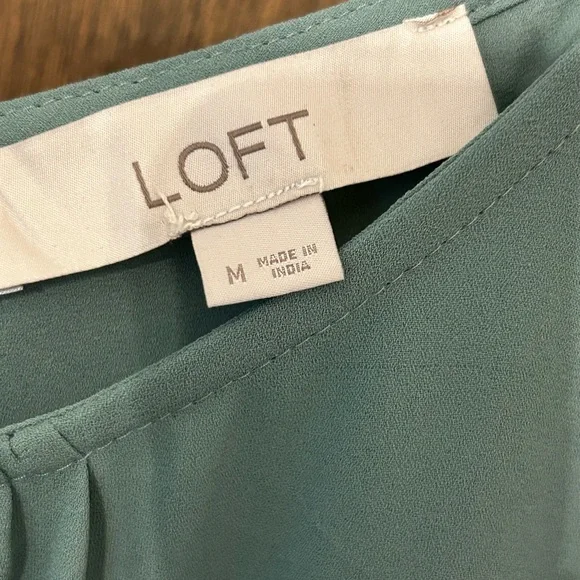Women’s top by Loft. Medium with short sleeves and button down back, so cute. - Picture 2 of 4